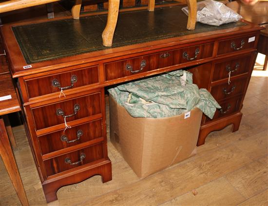 A modern yew wood pedestal desk, W.137cm H.76cm D.68cm